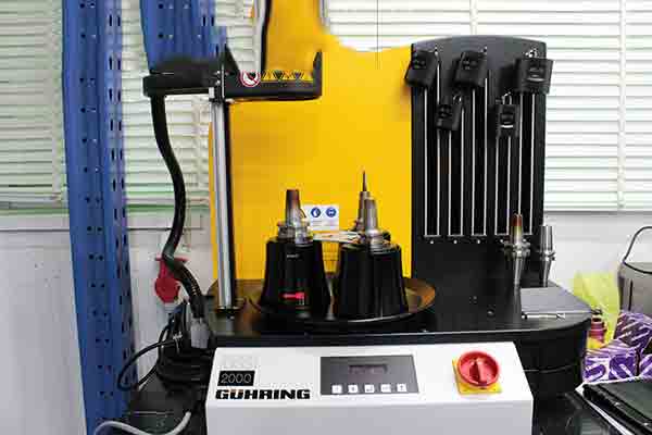 Guhring induction heat shrink tool changer at Michigan CNC Machining Parts, Inc.