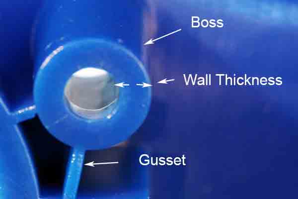 Image of boss detail from Michigan CNC Machining Parts, Inc. for DFM instruction