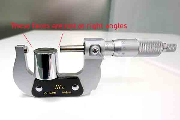 Micrometer measuring inverted cone, Michigan CNC Machining Parts, Inc.