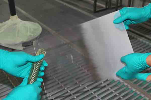Demonstrating vapor polishing with Weldon-4 gas at Michigan CNC Machining Parts, Inc.