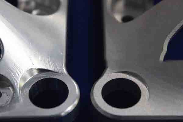 Samples of before-and-after sandblasted parts, Michigan CNC Machining Parts, Inc.